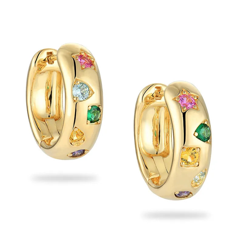 Gold hoop earrings with multicolored gemstones on a white background