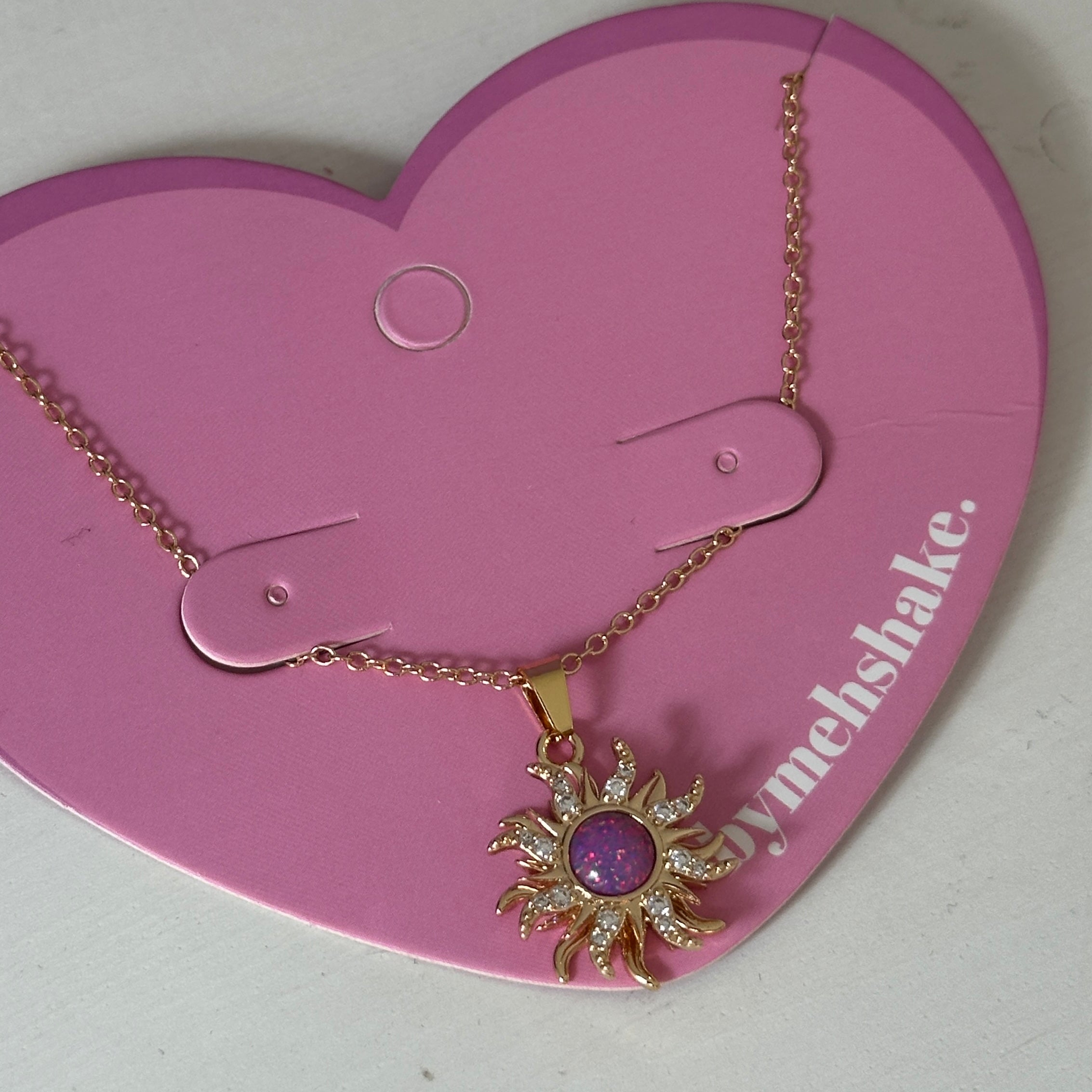 rapunzel sun spin necklace