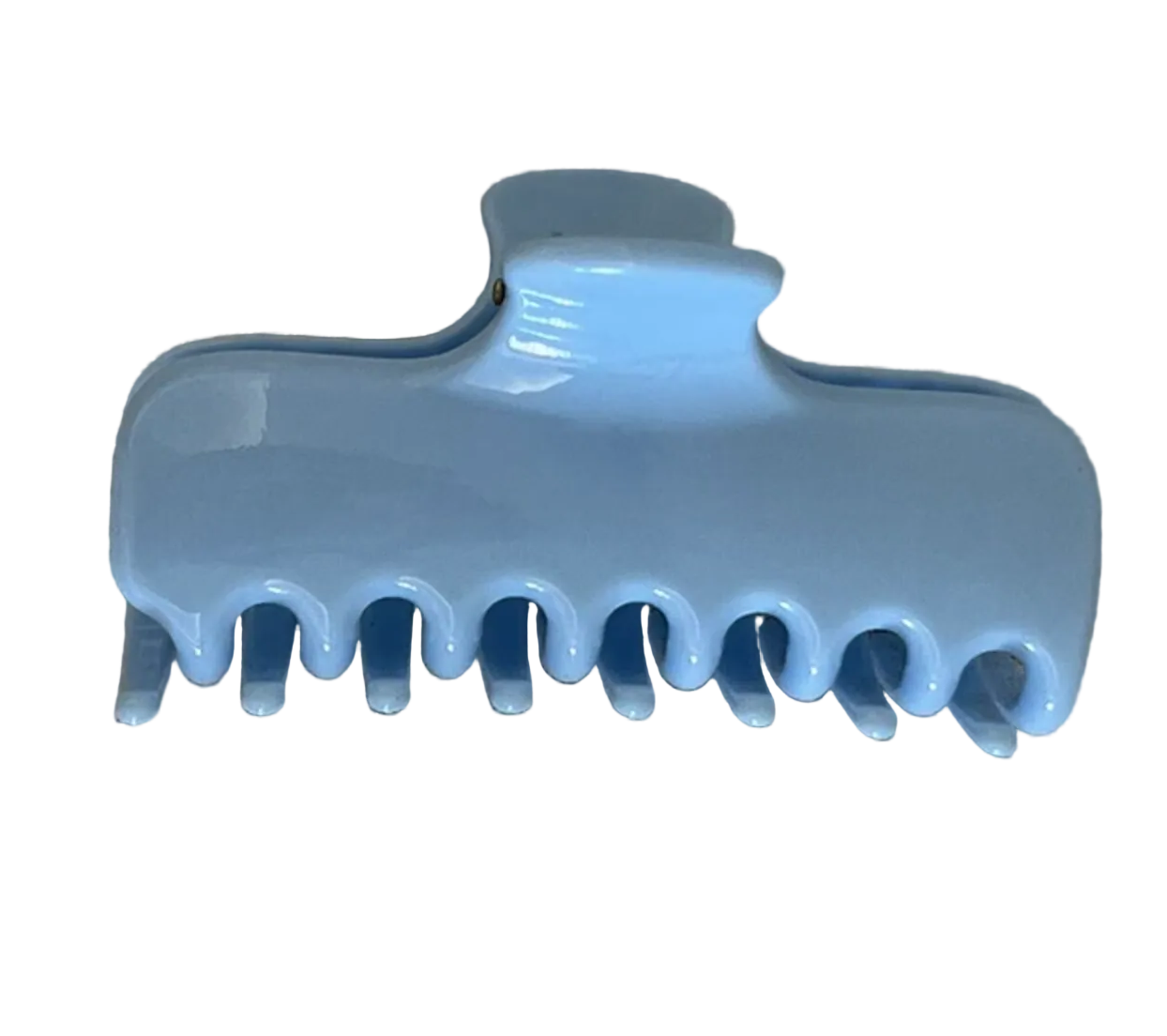 A glossy light blue hair claw clip placed on a textured beige fabric background.