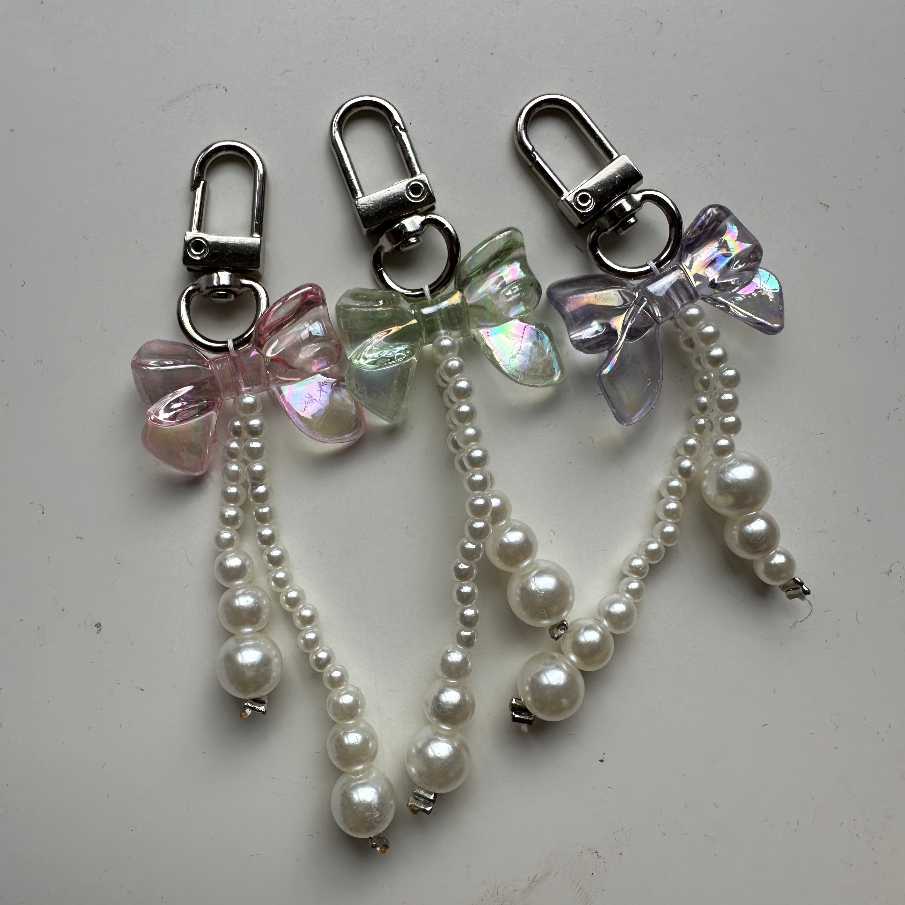 Bow pearl bag charm