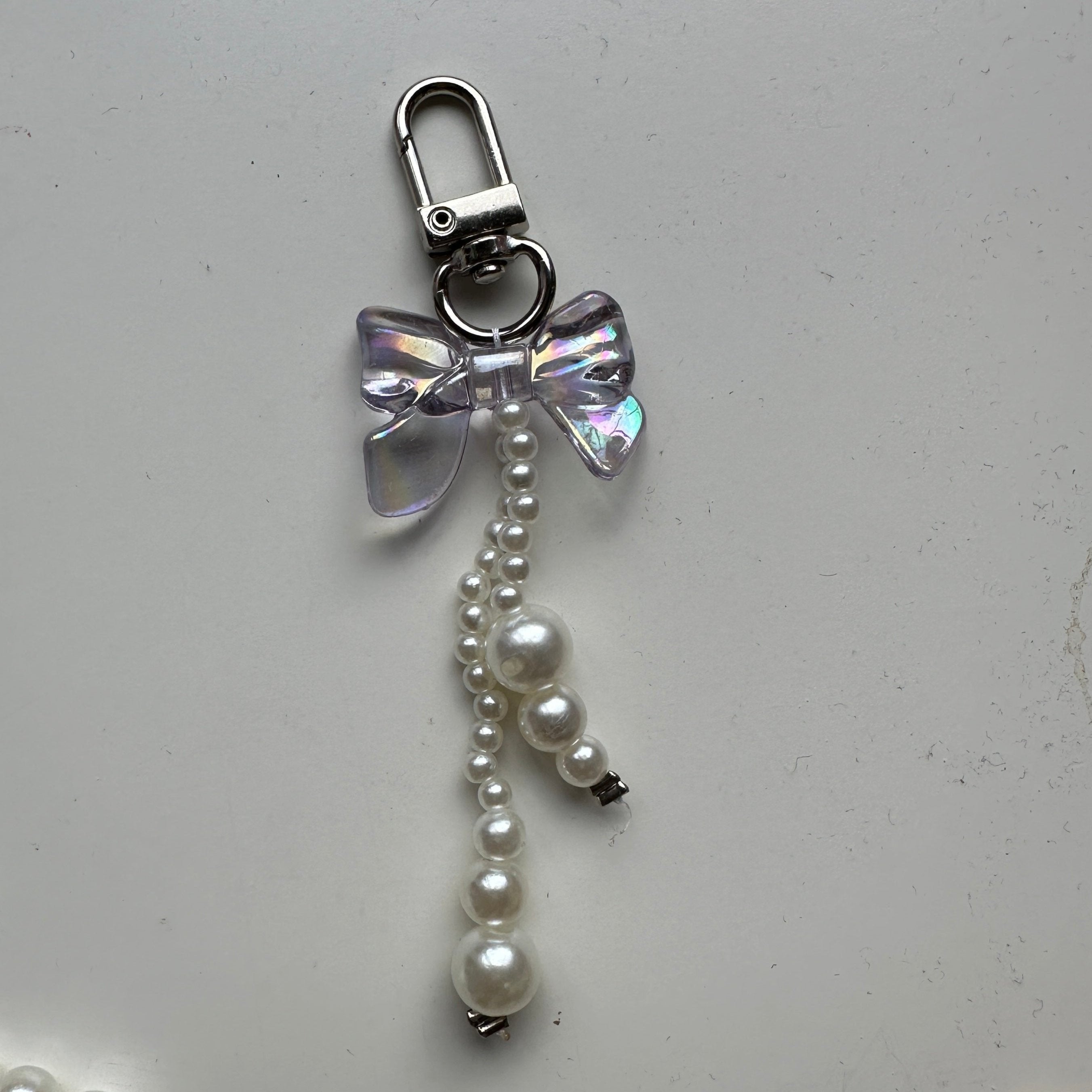 Bow pearl bag charm