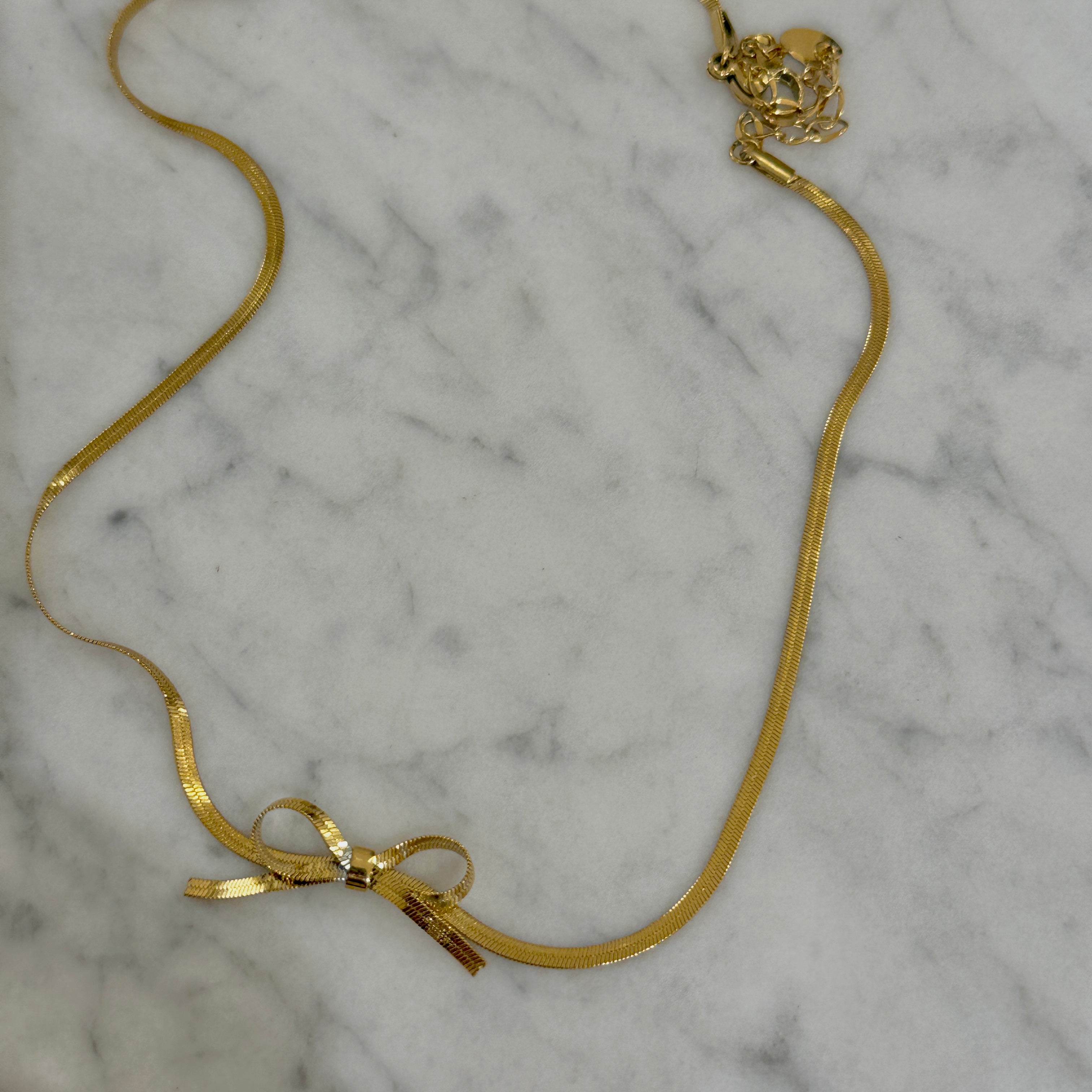 bow snake chain necklace