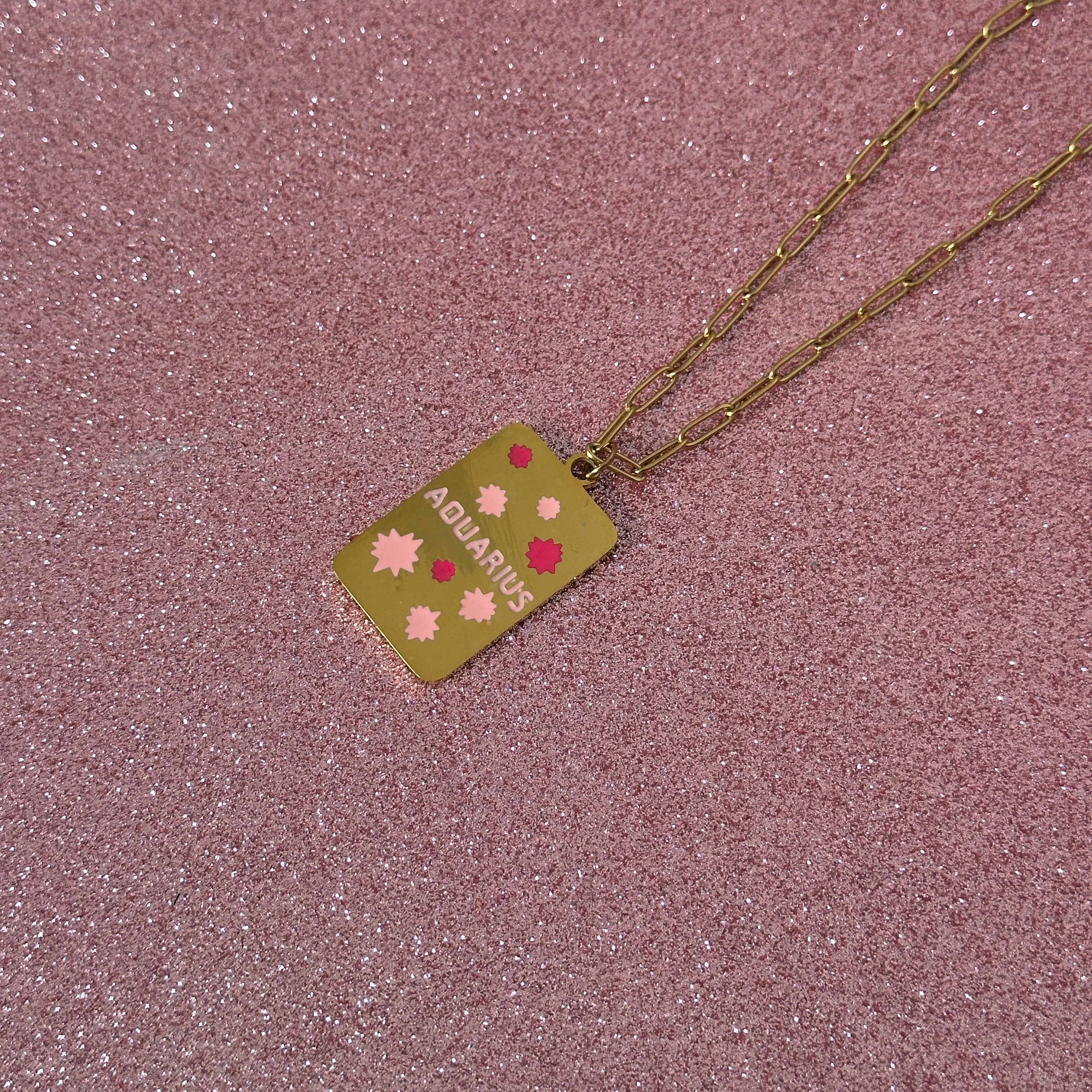 pink star sign necklace