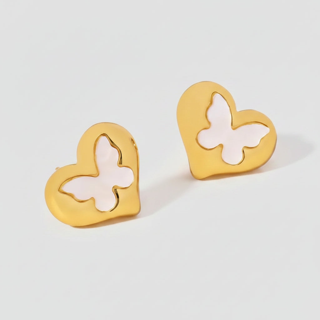 Heart-shaped earrings with butterfly design, showing measurements and material details on a white background.