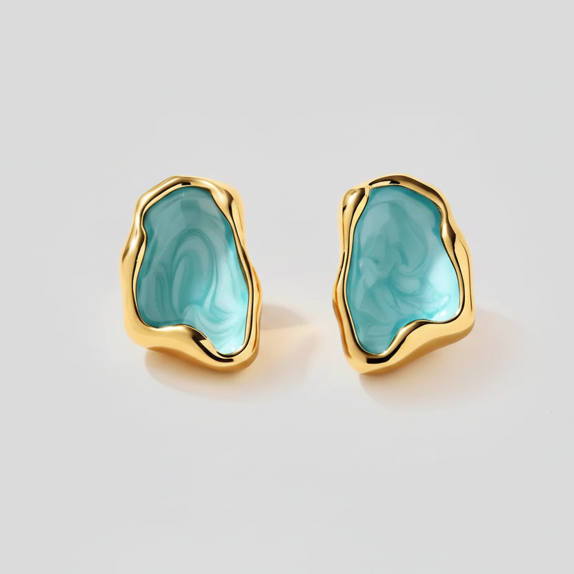 Gold earrings with turquoise stones, showing measurements and material details on a white background.