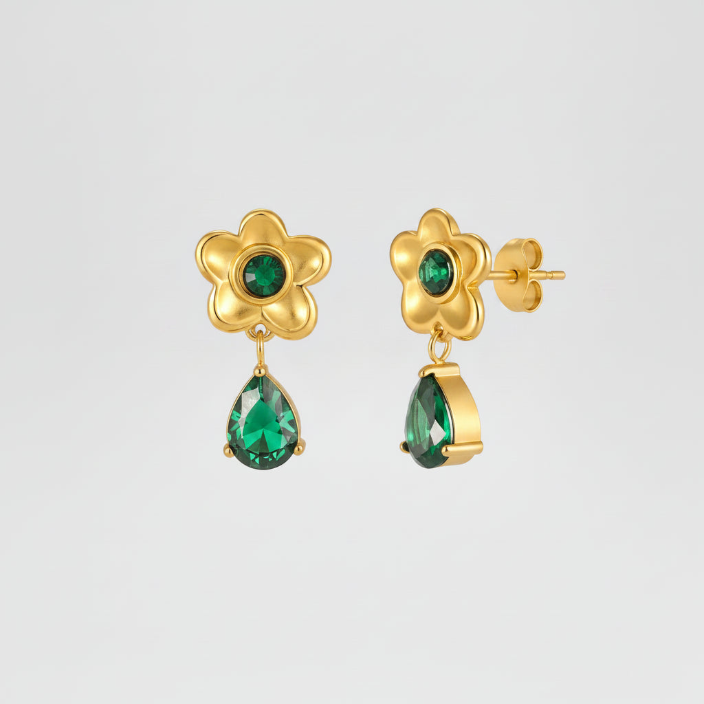 Gold earrings with green gemstones and measurements on a white background