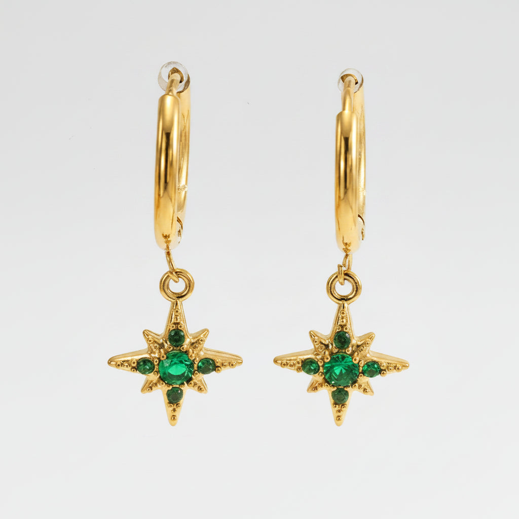 Gold earrings with green gemstones and measurements on a white background