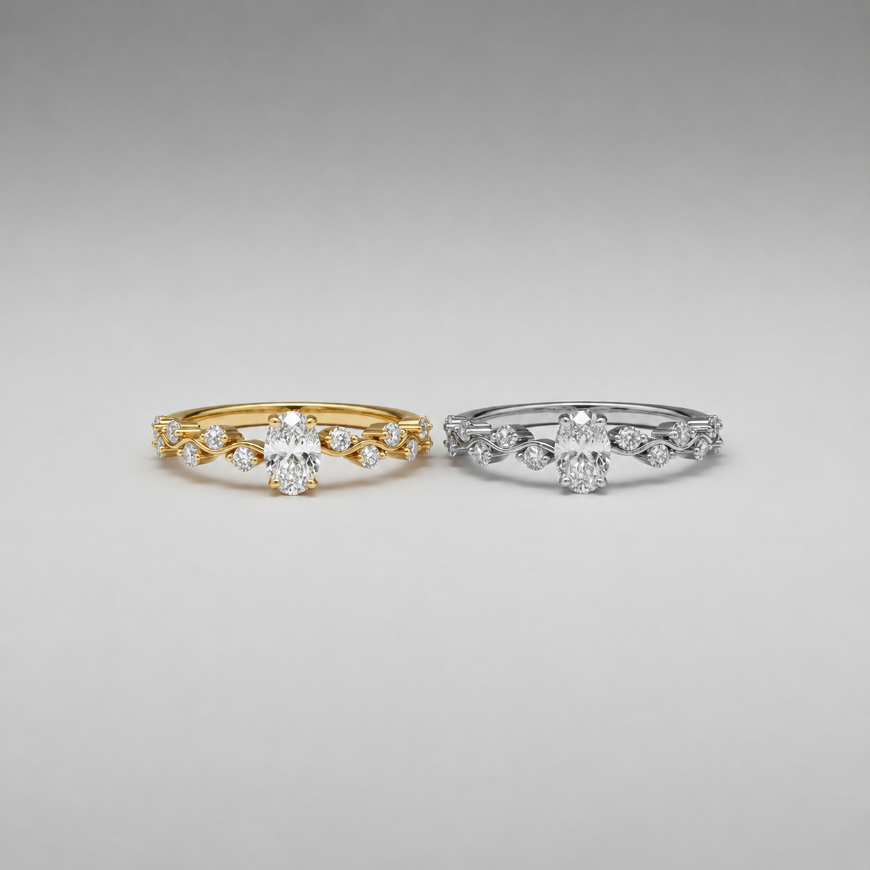Gold and silver Willow Vine Ring featuring an oval-cut crystal and delicate vine band, perfect for stacking or everyday wear.